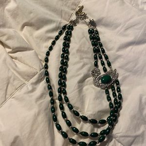 Navado 3 beaded strings bottle green swan 20”necklace.   $18.00